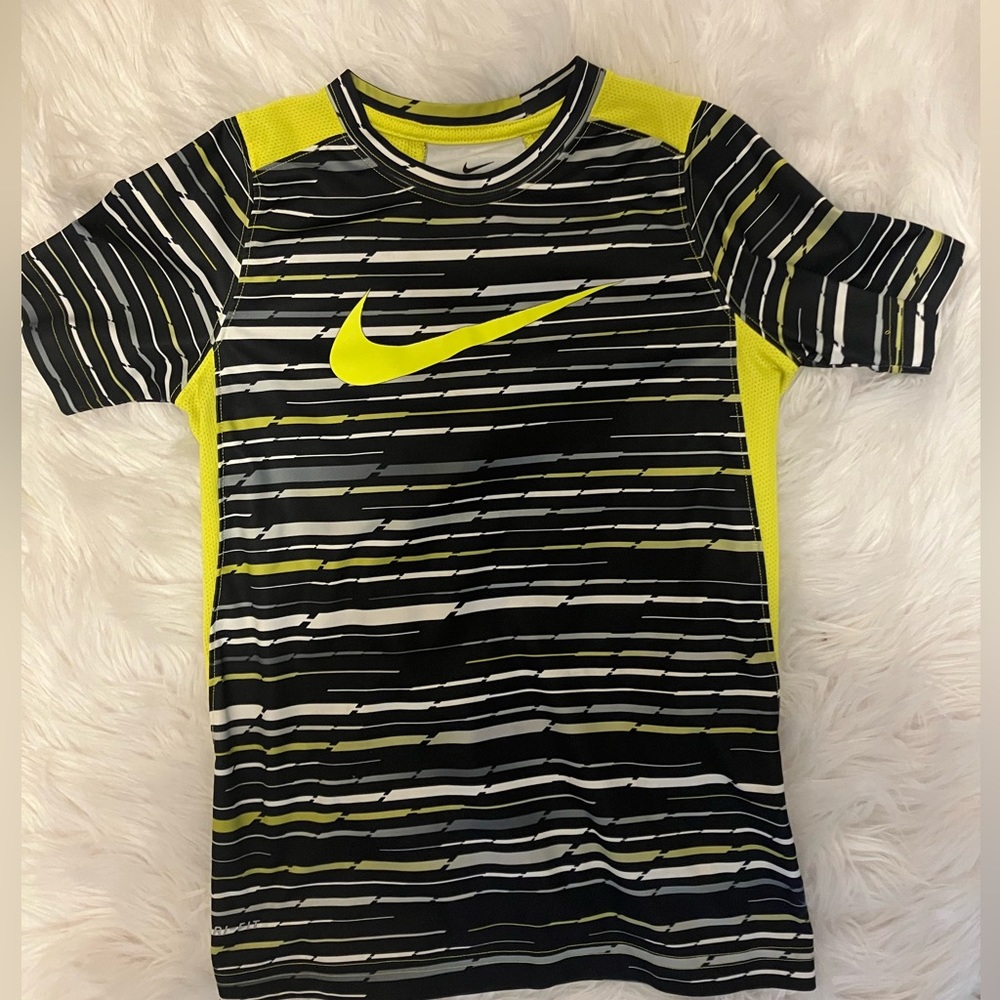 Nike kid size 8 athletic t-shirt. Lightly used.